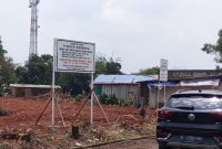 Keterangan foto: Papan nama milik PT Natura City sebelum dirobohkan oleh anggota TNI (dok. Istimewa) 