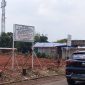 Keterangan foto: Papan nama milik PT Natura City sebelum dirobohkan oleh anggota TNI (dok. Istimewa) 